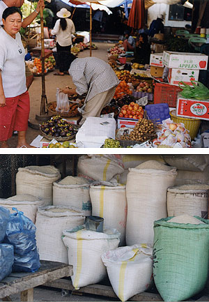 （写真3）シェム・レアップの市場。（上）豊富な果物。白桃・黄桃・ぶどう・レイチ・ランブータン・その他。（下）白米。画面の中だけで10種類ある。 2000年1月17日 吉野撮影©